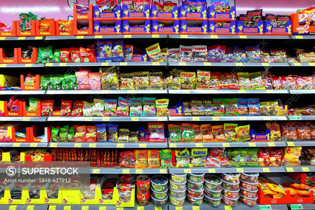 Shelves with various candies, self-service, food department, supermarket, Germany, Europe