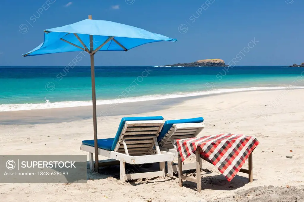 Sunloungers and a parasol at the beach, Pasir Putih or White Sand Beach, east of Candi Dasa, East Bali, Bali, Indonesia, Southeast Asia, Asia