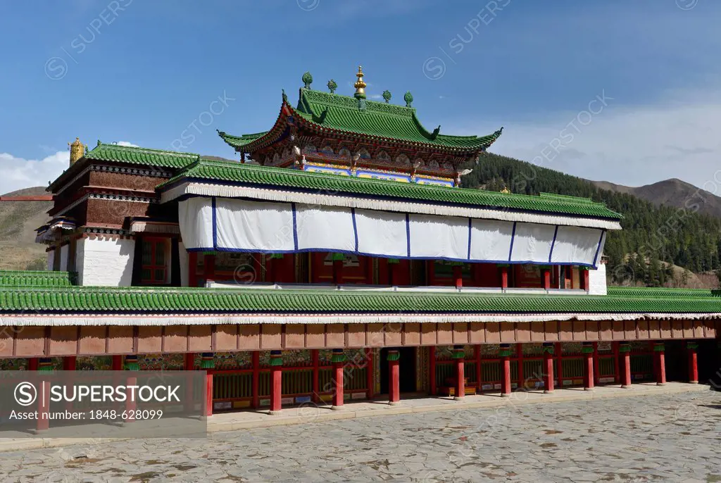 Tibetan Buddhism, monastery buildings built in the traditional Tibetan style, with green Chinese roof shingles and components, Labrang Monastery, Xiah...