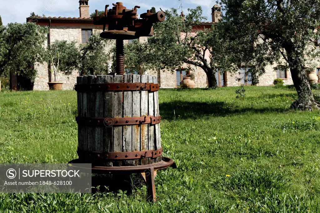 Old olive press in front yard of a Tuscan villa, Ripabella, Tuscany, Italy, Europe