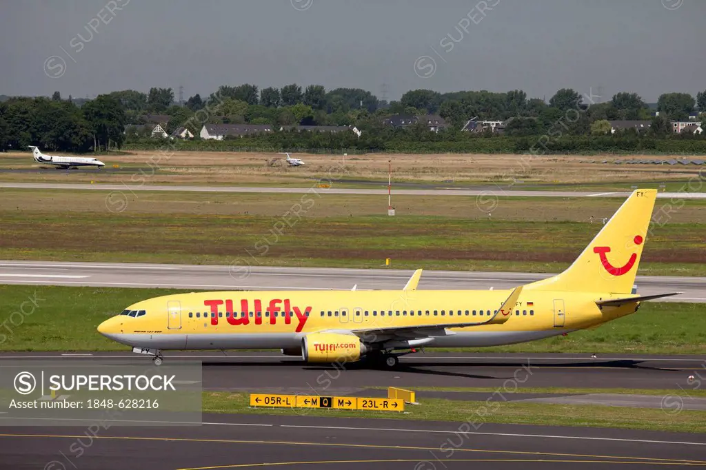 TUIfly aircraft, Boeing 737-800 on the runway, Duesseldorf Airport, Rhineland region, North Rhine-Westphalia, Germany, Europe