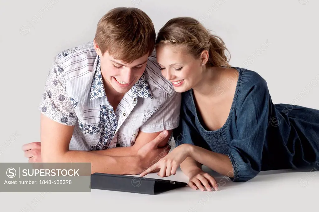 Young couple with iPad