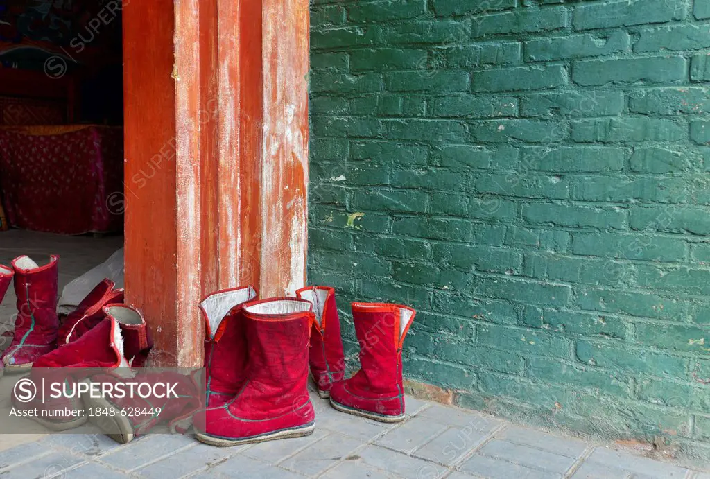 Tibetan Buddhism, boots of Tibetan monks, felt boots, in the monastery building, Tongren Monastery, Repkong, Qinghai, formerly Amdo, Tibet, China, Asi...