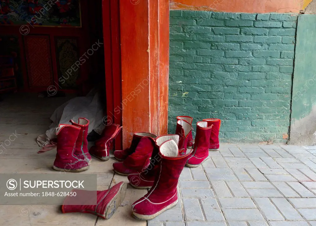 Tibetan Buddhism, boots of Tibetan monks, felt boots, in the monastery building, Tongren Monastery, Repkong, Qinghai, formerly Amdo, Tibet, China, Asi...