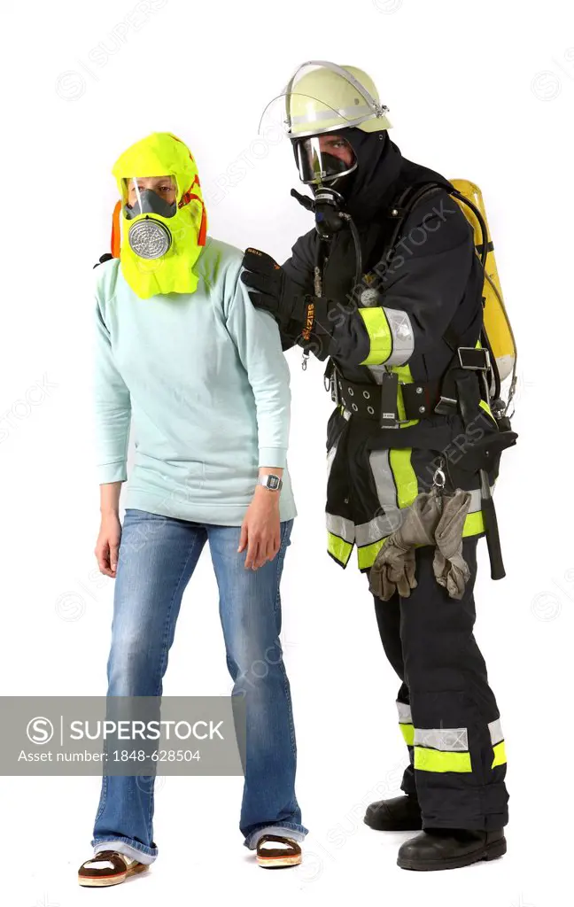 Firefighter wearing respiratory protective equipment with a person wearing an emergency smoke hood that is used to evacuate through smoke, protects fo...