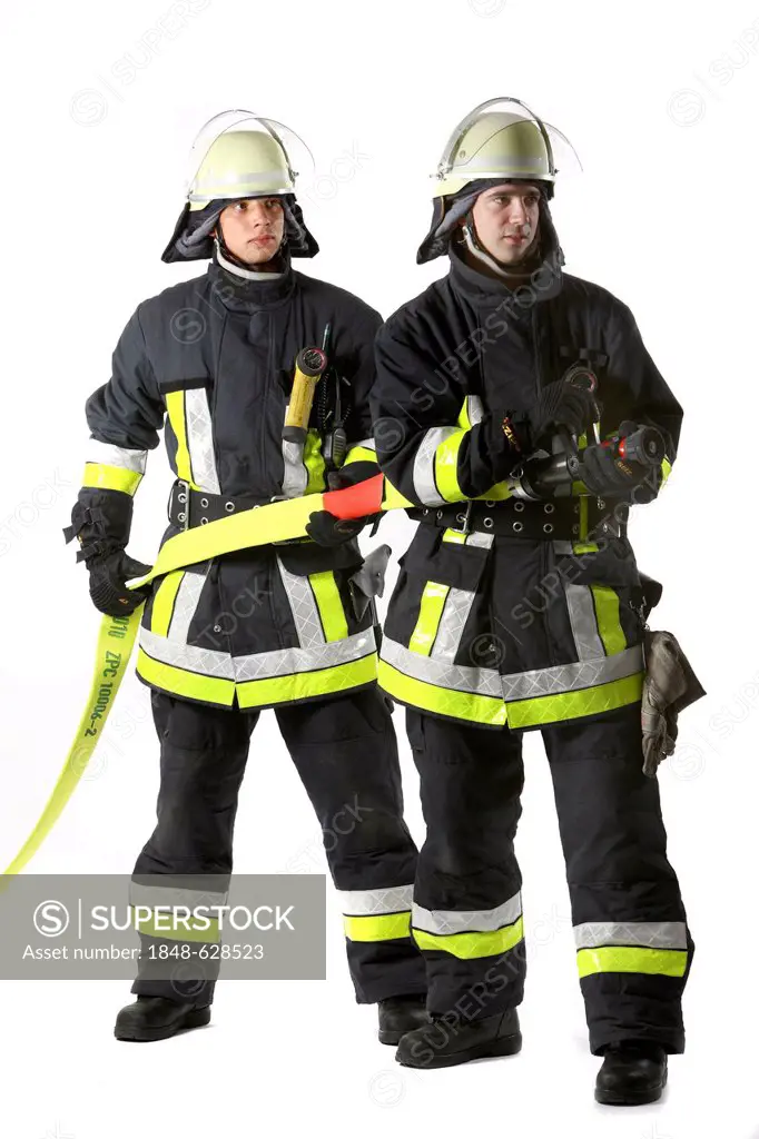 Firemen, part of a response squad for firefighting, with protective clothing made of Nomex, a helmet with a visor, a fire axe, respiratory protective ...