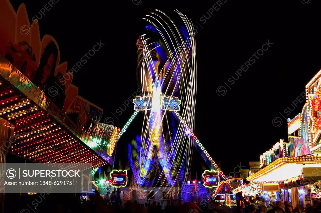 Fairground ride at night, amusement park, marksmen's festival, Biberach, Upper Swabia, Baden-Wuerttemberg, Germany, Europe