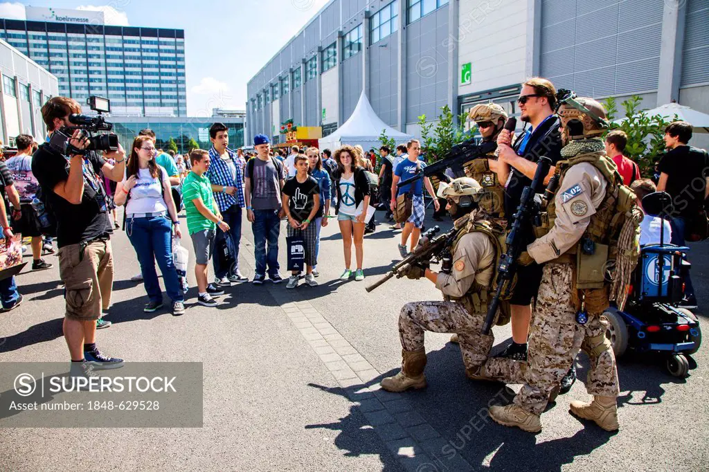 Martial promotion for an action-war game, a first person shooter war game, Medal of Honor - Warfighter, Gamescom, the world's largest trade fair for i...