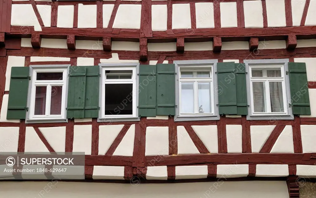 Half-timbered facade with windows, detail, Brackenheim, Zabergaeu, Baden-Wuerttemberg, Germany, Europe