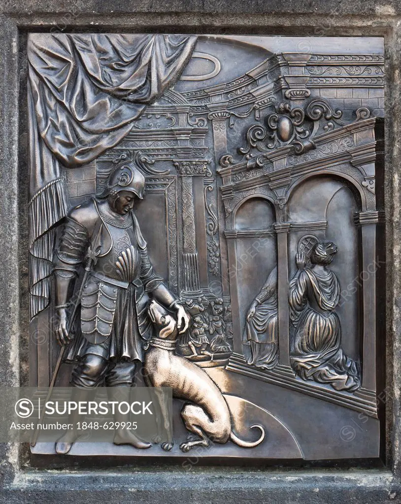 Bronze relief, Aristocrat with Dog, on the statue of St. John Nepomuk, Charles Bridge, Prague, Czech Republic, Europe