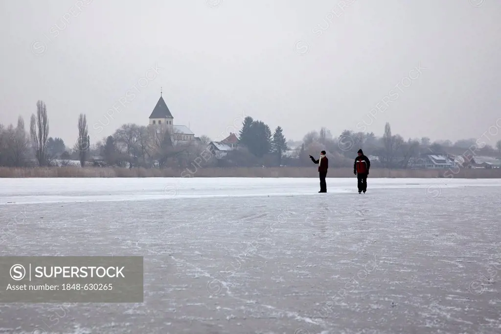 Frozen Lake Constance with people between Reichenau island and Hegne, Lake Constance, Baden-Wuerttemberg, Germany, Europe