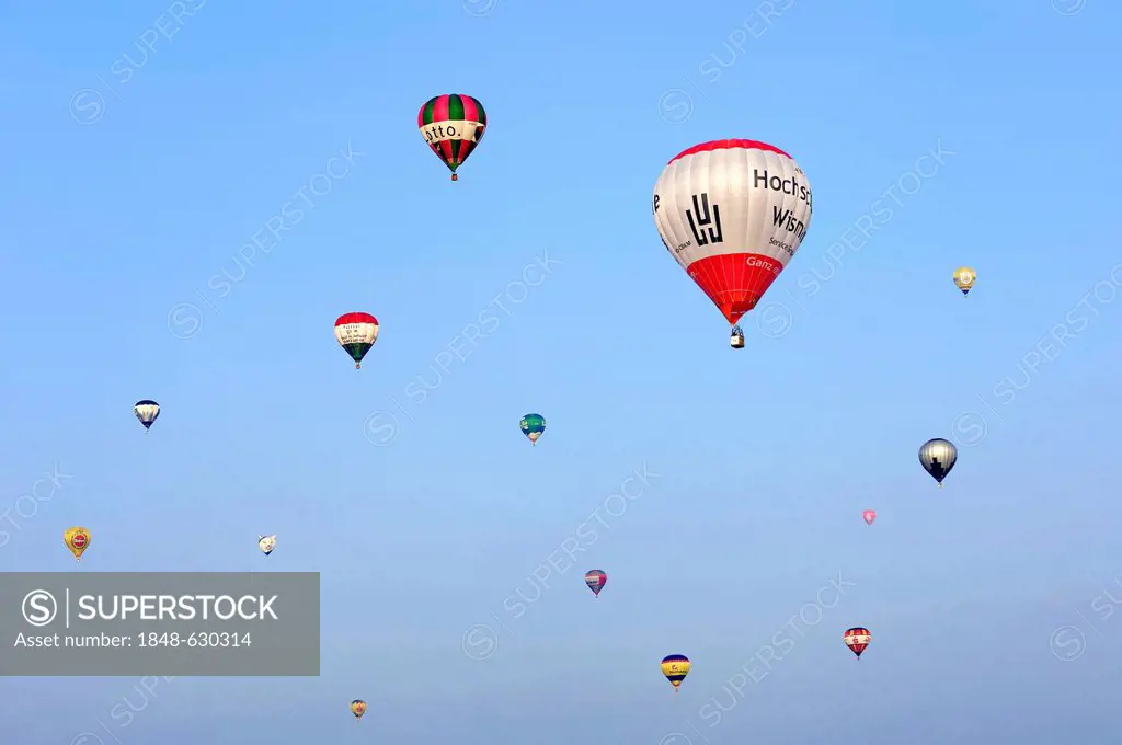 Hot air balloons at the Montgolfiade hot air balloon festival in Muenster, Muensterland region, North Rhine-Westphalia, Germany, Europe