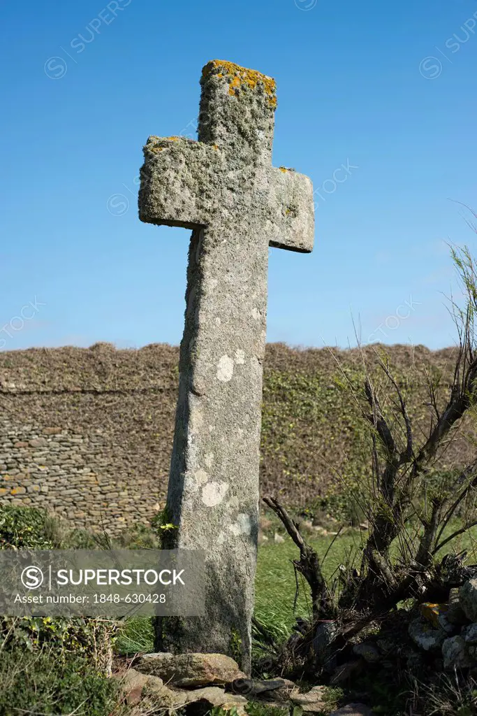 High stone cross at the ruins of St Mathieu monastery, cape Pointe de Saint Mathieu, Finistère department of Brittany, France, Europe
