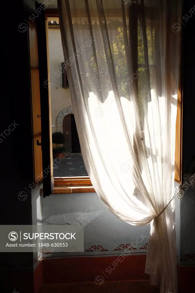 View through a transparent white curtain on a piazza, Tuscany, Italy, Europe