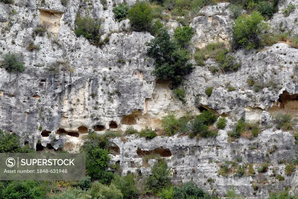 Chambered tombs in the UNESCO world heritage site of the Sicel necropolis of Pantalica, situated in the Monti Iblei between Ferla and Sortino, Sicily,...
