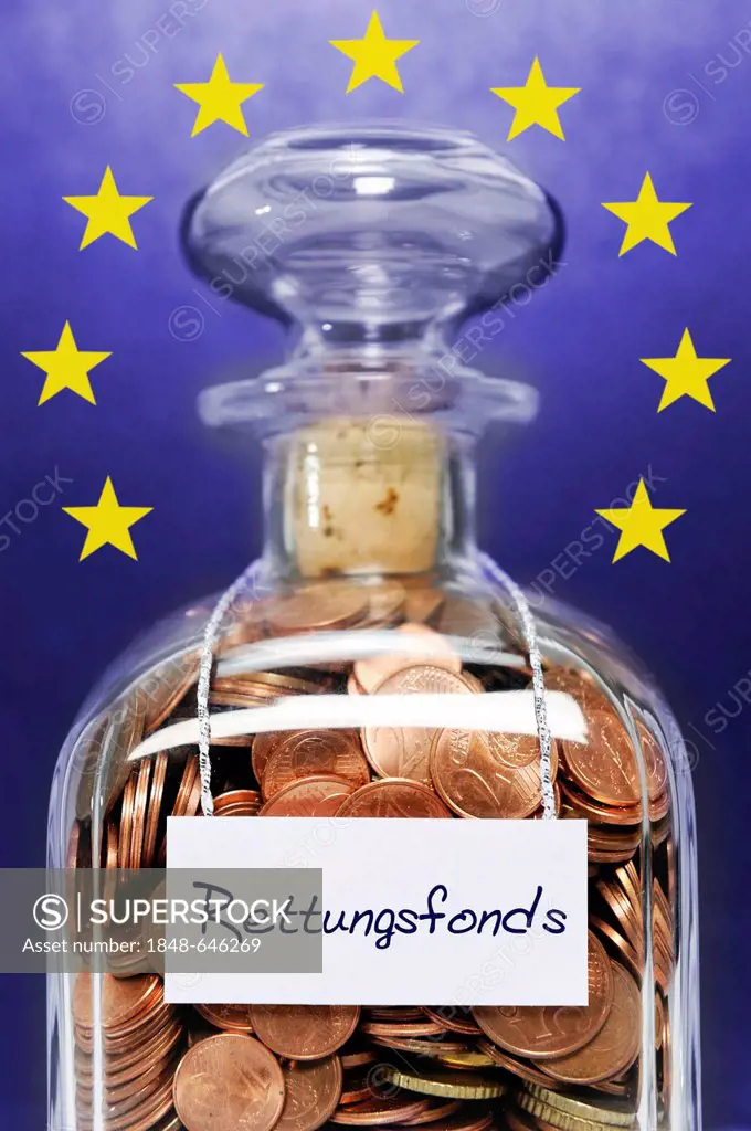 Bottle full of cent coins labelled with the inscription Rettungsfonds, German for rescue fund, symbolic image for increasing the EU rescue fund