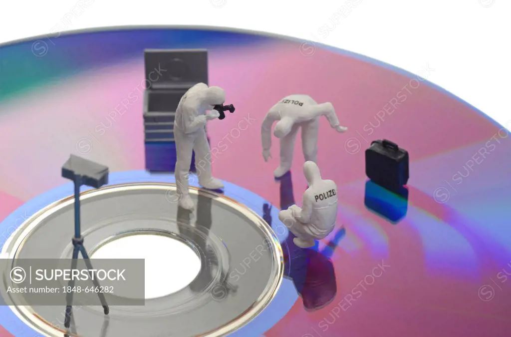 Forensics, figurines, data CD, symbolic image for data theft, piracy