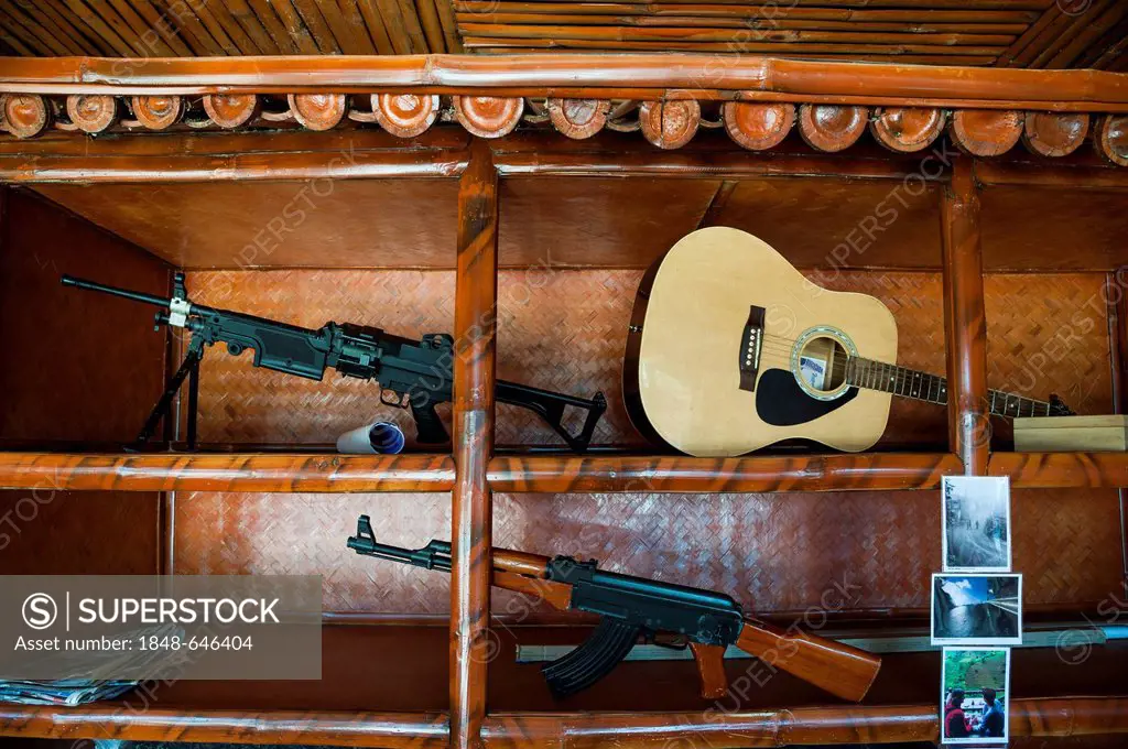Guitar, gun, decoration in a shop, Santikhiri or Mae Salong area, Chiang Rai province, northern Thailand, Thailand, Asia
