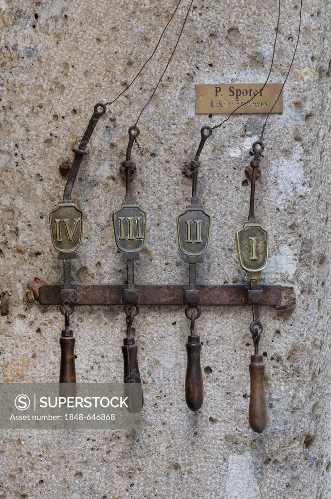 Four historic pull-cables for doorbells, Haus Sporer Likoer, Getreidegasse, Salzburg, UNESCO World Heritage Site, Austria, Europe