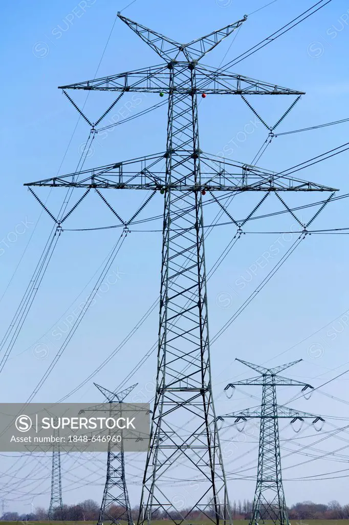 Electricity pylons, Brunsbuettel, Schleswig-Holstein, Germany, Europe