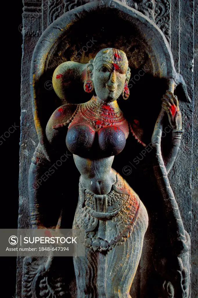 Sculpture of a woman decorated with kumkum powder, entrance of Minakshi, Meenakshi or Sri Meenakshi-Sundareshwara Temple, Madurai, Tamil Nadu, South I...