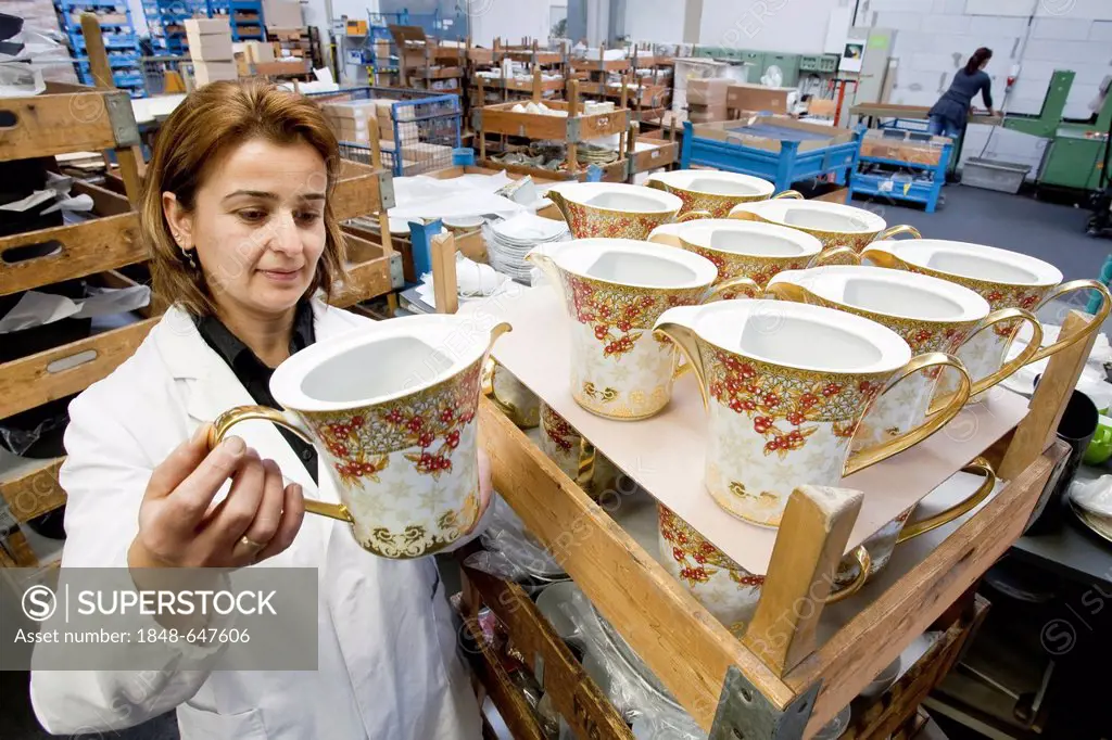 Employee during the final inspection of Versace teapots at the porcelain manufacturer Rosenthal GmbH, Speichersdorf, Bavaria, Germany, Europe
