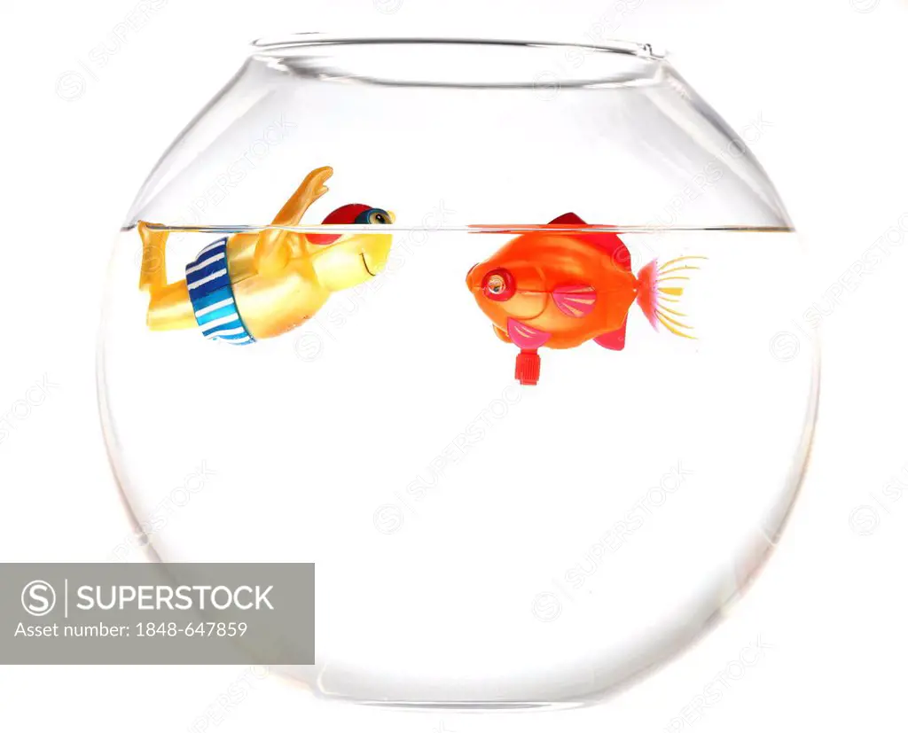 Wind-up toy figure of a boy swimming with a toy fish in a fish bowl, illustration