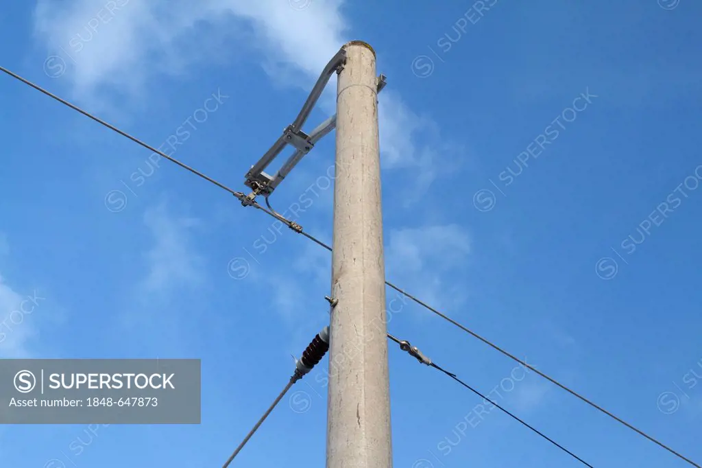 Overhead contact wire at a railway line with blue sky, Hesse, Germany, Europe