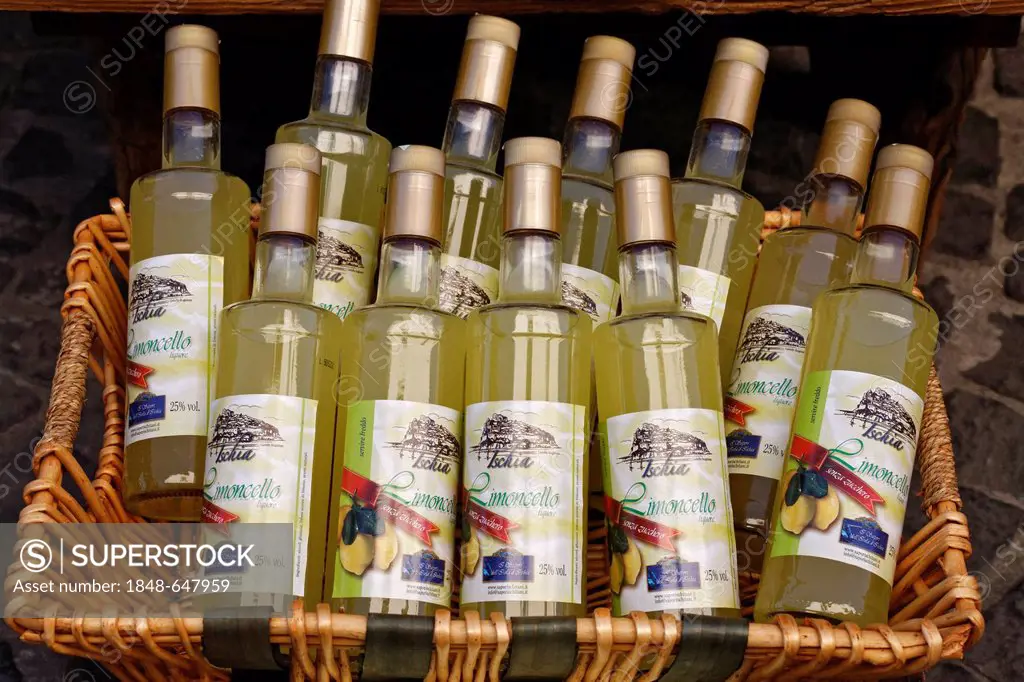Basket with bottles of limoncello for sale, Ischia Island, Gulf of Naples, Campania, Southern Italy, Italy, Europe