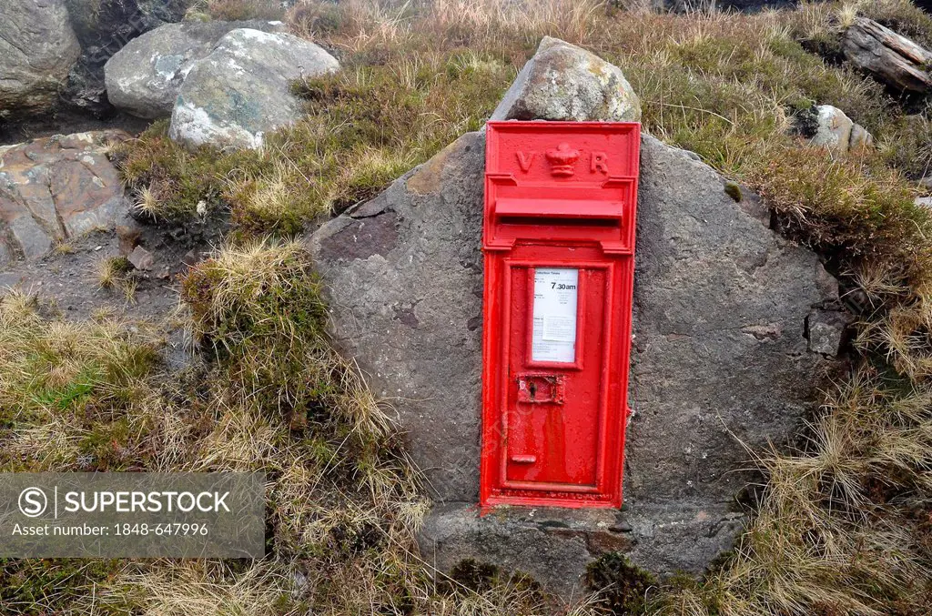 Red mail box of the British post set into a boulder, Western Ross, Melvaig, Highlands, Scotland, United Kingdom, Europe