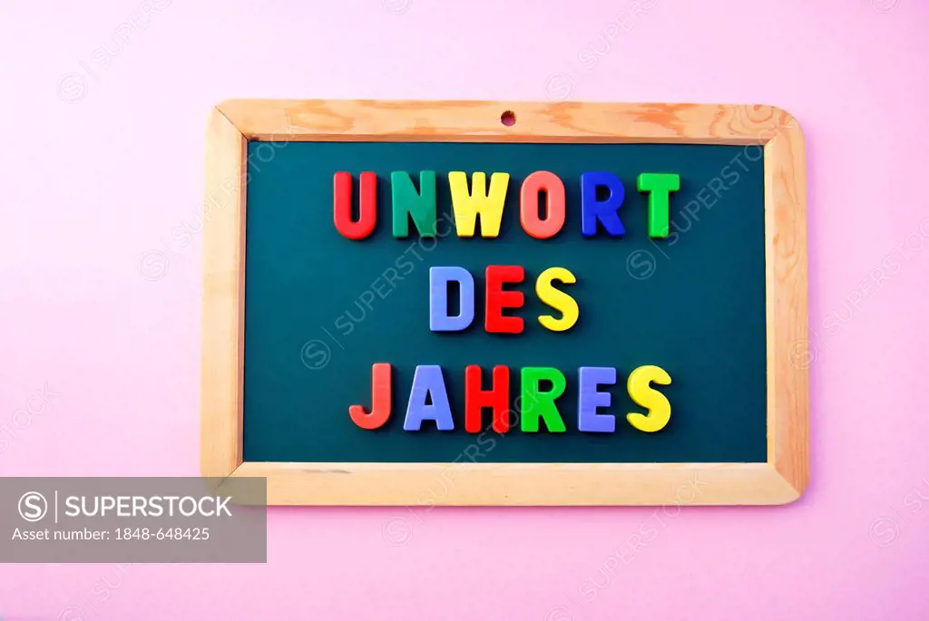 Unwort des Jahres, German for Worst Word of the Year, written in colourful magnetic letters on a school board