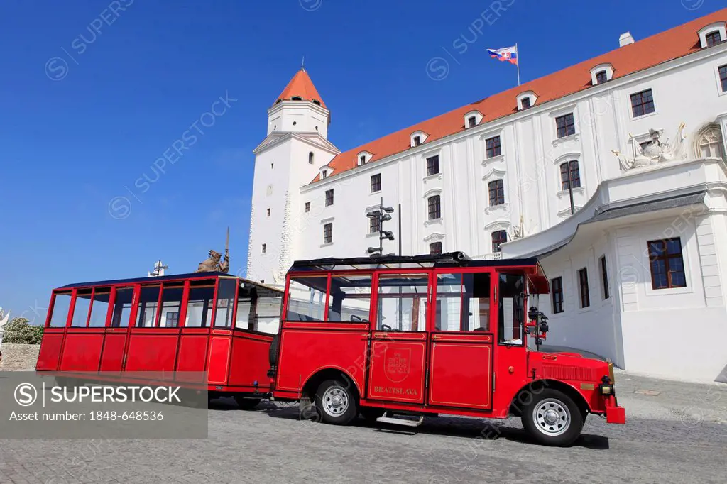 Classic car with trailer used for sightseeing tours in front of, Bratislava Castle, Bratislavsky hrad, Bratislava, Slovak Republic, Europe