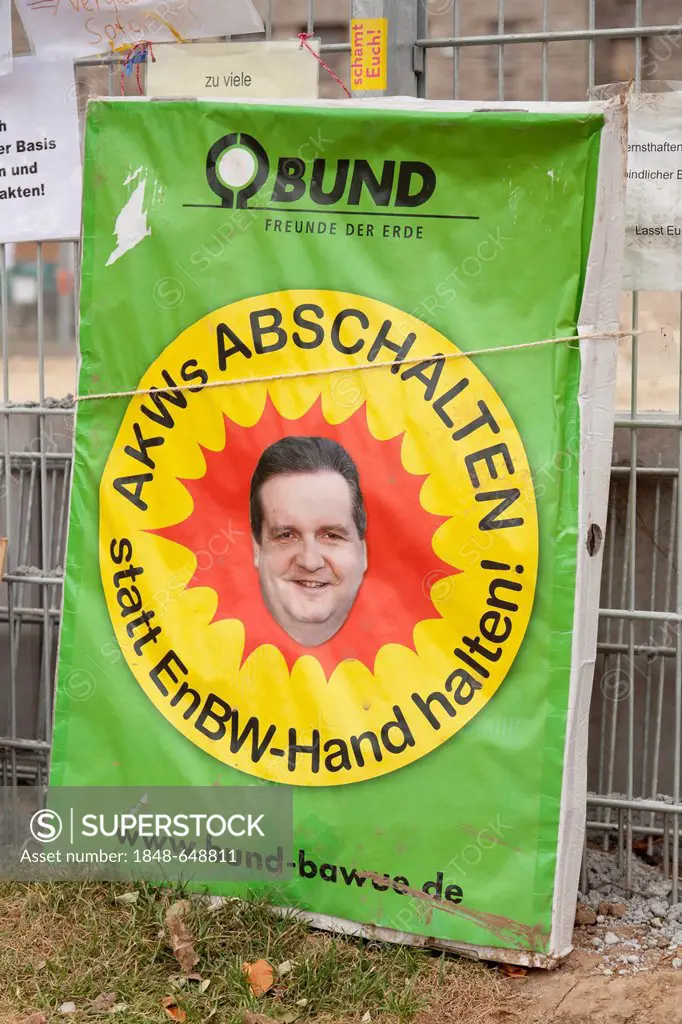 Protest poster AKWs abschalten statt EnBW-Hand halten, German for shut down nuclear power plants instead of holding hands with power company EnBW, pos...
