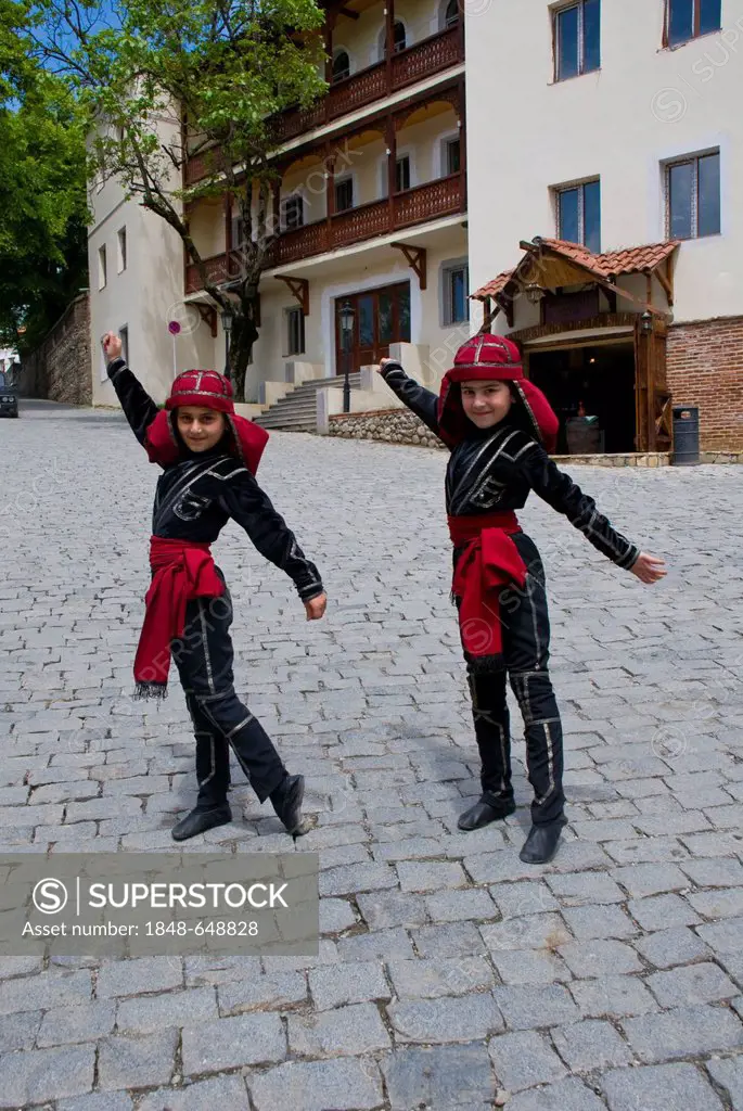 Two girls wearing costumes, Sighnaghi, Kakheti province, Georgia, Caucasus region, Middle East