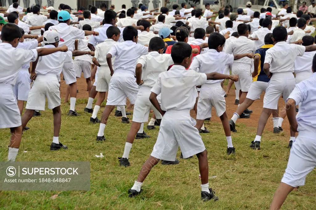 Karate exercises, boys wearing white school uniforms, Galle, Sri Lanka, Ceylon, Asia