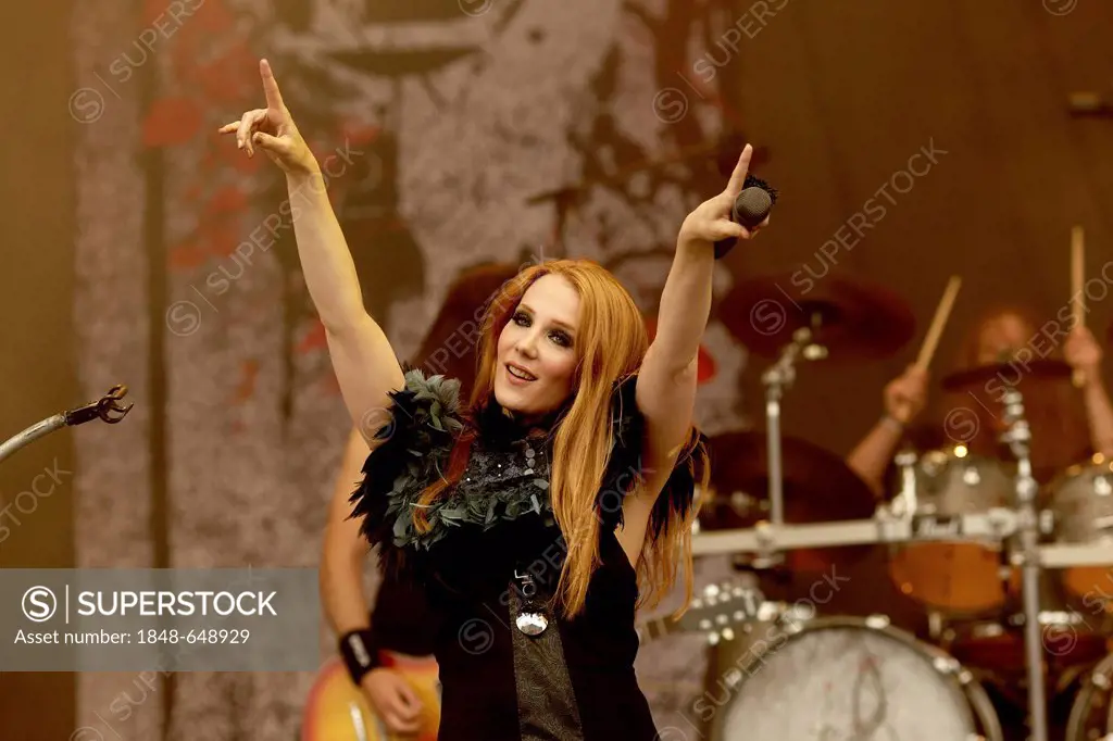 Simone Simons, singer of the Dutch symphonic metal band Epica with bass-guitarist Rob van der Loo playing at the Metalfest, Loreley open air stage, St...