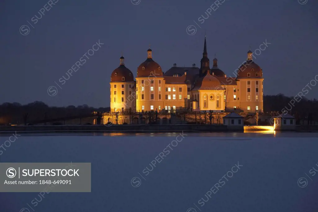 Schloss Moritzburg Castle near Dresden in winter, with snow at dusk, Saxony, Germany, Europe