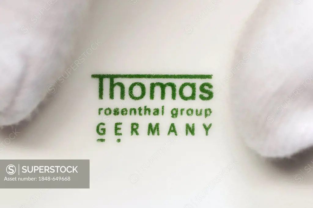 Logo and lettering of Thomas, belonging to Rosenthal GmbH, on the bottom of a plate, at the porcelain manufacturer Rosenthal GmbH, Speichersdorf, Bava...