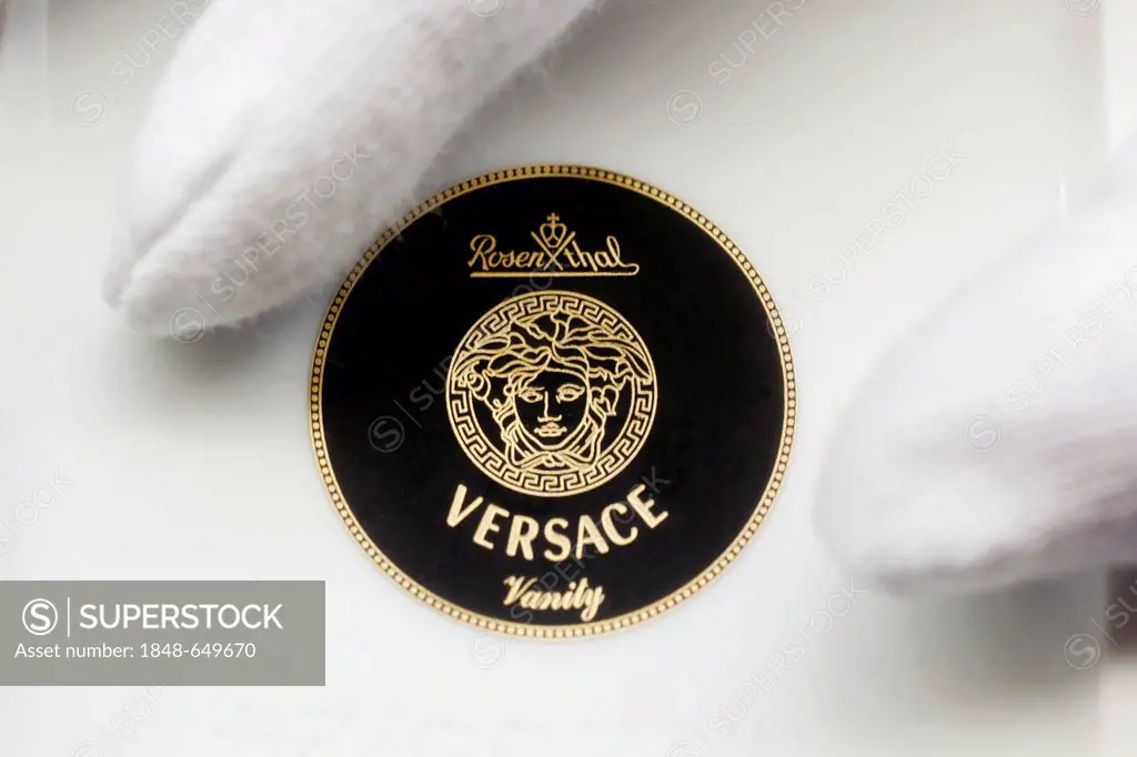 Logo and lettering of Versace, belonging to Rosenthal GmbH, on the bottom of a plate, at the porcelain manufacturer Rosenthal GmbH, Speichersdorf, Bav...