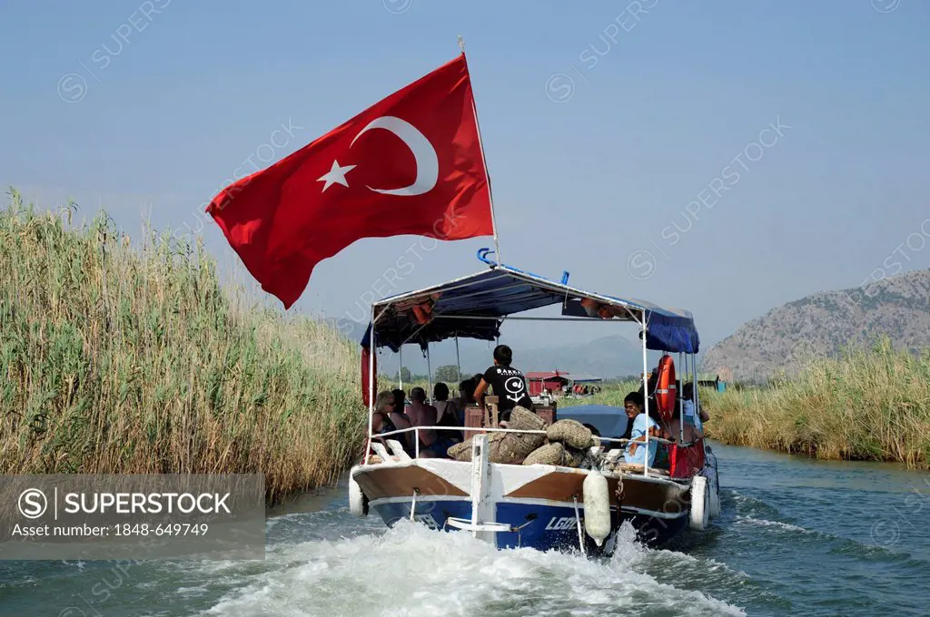 Excursion boat on a river, river delta in the nature preservation area between Caunos and Iztuzu Beach, Dalyan, Mugla Province, Turkey, Asia Minor