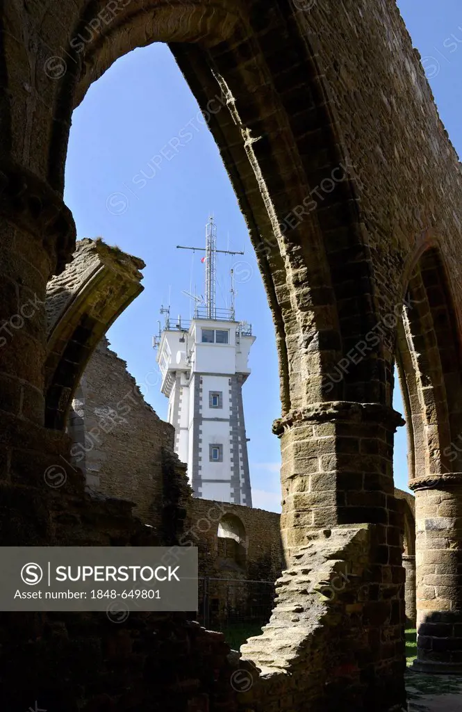 View through the Gothic arch of the monastery ruins to the naval control tower, Cape Pointe de Saint Mathieu, Département Finistère, Brittany, France,...