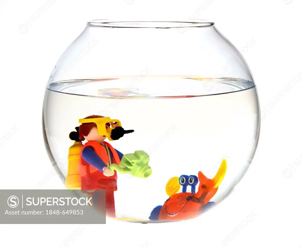 Toy scuba diver with an underwater camera and a crab in a fish bowl, illustration