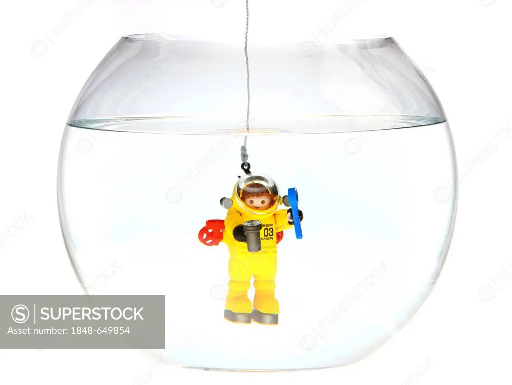 Toy deep sea diver diving in a fish bowl, illustration
