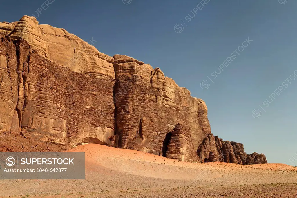 Desert plain with a rising mountain massif, Wadi Rum, Hashemite Kingdom of Jordan, Middle East, Asia