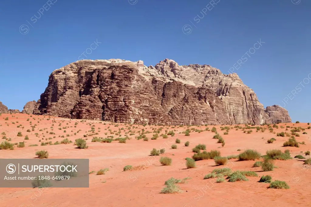 Mountains, vast plains and desert shrubs, Wadi Rum, Hashemite Kingdom of Jordan, Middle East, Asia