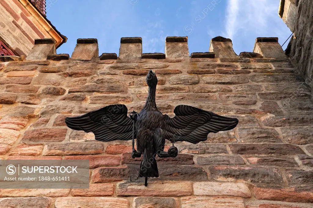 Eagle figure with sceptre and orb above the entrance gate of Abenberg Castle, Abenberg, Middle Franconia, Bavaria, Germany, Europe