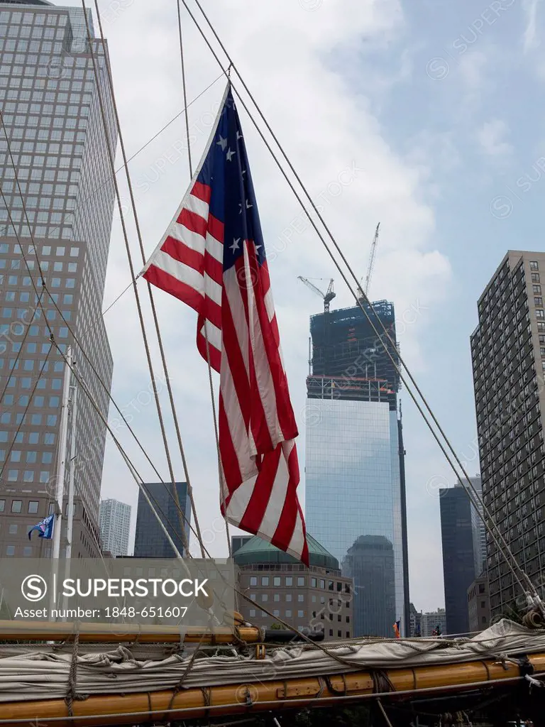 U.S. flag on a sailing ship in front of the Freedom Tower, New York City, USA, North America, America