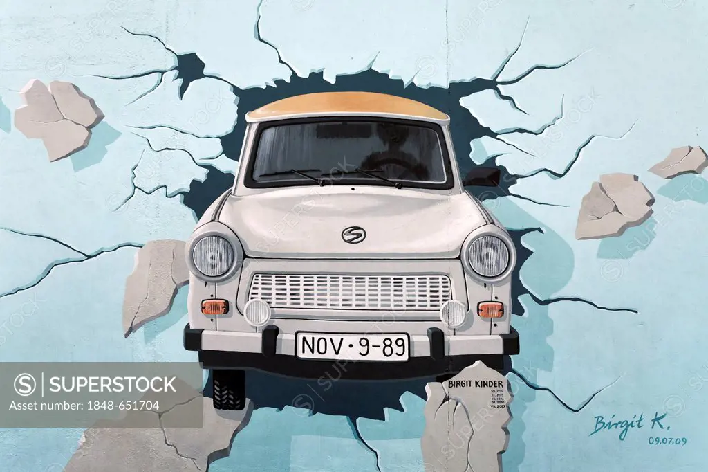 Trabant or Trabi breaking through the Berlin Wall, painting by Birgit Kinder, East Side Gallery, Friedrichshain district, Berlin, Germany, Europe