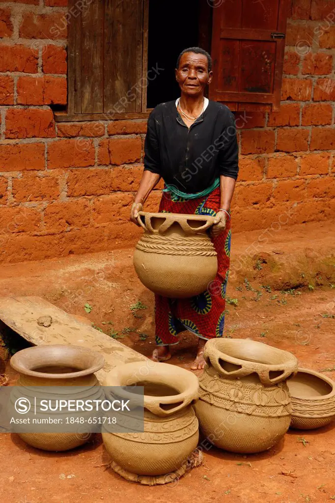 Women in the production of traditional pottery, Babessi, Cameroon, Africa
