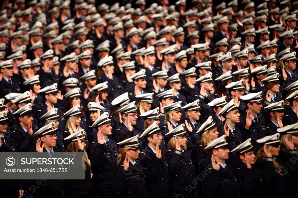 Swearing-in ceremony of 1100 policemen and policewomen to the NRW Police Force, Class of 2010, in the Grugahalle in Essen, North Rhine-Westphalia, Ger...